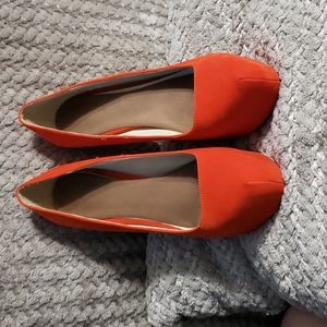 Sexy orange platform heels.